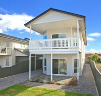 Century 21 SouthCoast White Caps - Holiday Cairns