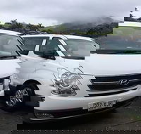 IMAX Private Transfer 7 Guests Cairns Airport to Hotels in Cairns City - Holiday Cairns