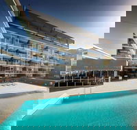 Honeysuckle Executive Apartments - Holiday Cairns