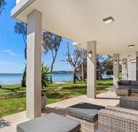 Paradise Beach House Waterfront with Heated Pool - Holiday Cairns