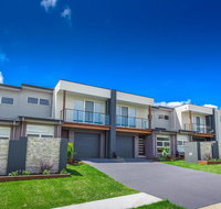 Escape At Nobbys Executive Townhouse 1 74 Pacific Drive - Holiday Cairns