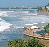 Family Romance Fun on Kings Beach - Holiday Cairns
