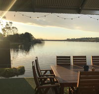 Shack built over the Murray River - Holiday Cairns