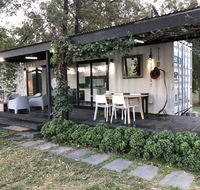 Absolute riverfront shipping container cabin - Holiday Cairns