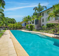 Baden 65 - Rainbow Shores Overlooking lap pool Ground Floor Air Conditioning - Holiday Cairns